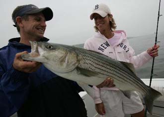 The now Mrs. Liz Vittulo smiles as Cap'n Neal is seen holding a "Big One" that DIDN'T get away! ><////|^|\\\| i >